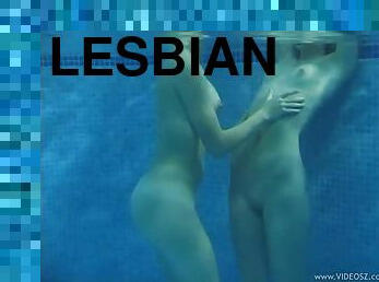 Teen Lesbians Playing With A Vibe In The Pool