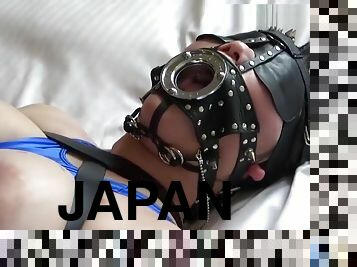 Japanese Teen Girl With Leather Bandage