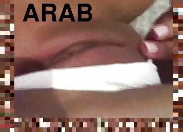 Moroccan girl fingers her pussy