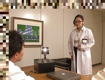 In the office a Japanese doctor fucked by two of her assistants