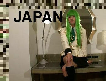 Sexy green wig on a Japanese tranny fingering her asshole