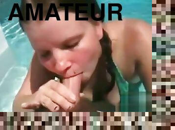 Young Girl Gives Boyfriend Blow Job In Pool