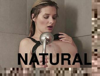 Pretty blonde with gorgeous natural tits touching her sexy body in the shower