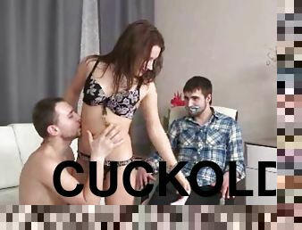 Her man is tied up and gagged as she fucks another dude