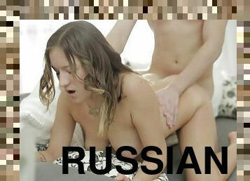 Jizzing over her Russian booty after fucking her good