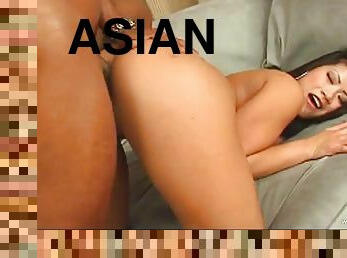 Asian babe with nice ass is being violated in interracial doggystyle sex