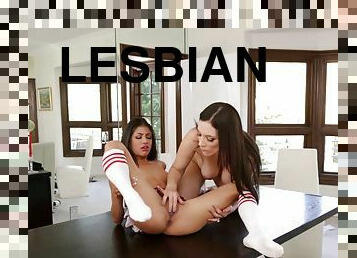 Doting lesbians passionately make out at their apartments in a close up shoot