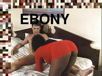 Interracial bed sex action with a curvy ebony pornstar