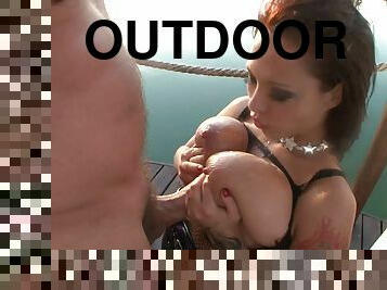 Tattooed sluts in stockings fuck hard with a stud outdoors