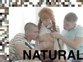 A cute, redheaded coed gets tag teamed by two guys at once