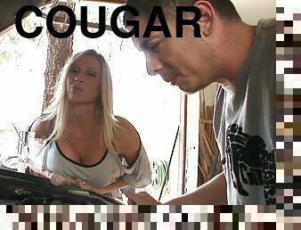 Vivacious cougar with long blonde hair enjoying a hardcore missionary style fuck