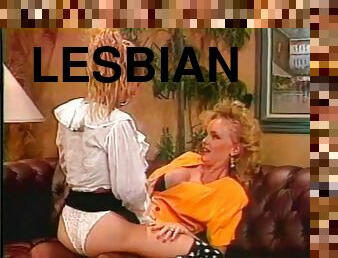 Two fair-haired lesbians share a double dildo in retro sex video