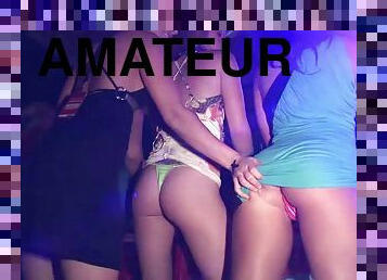 Depraved amateur chicks flash theis butts in a club
