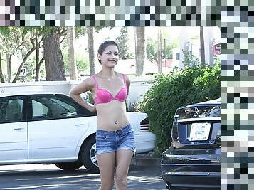 A daring, very pretty girl gets naked and walks around in public