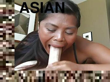Asian with long hair gives blowjob before getting cum splashed