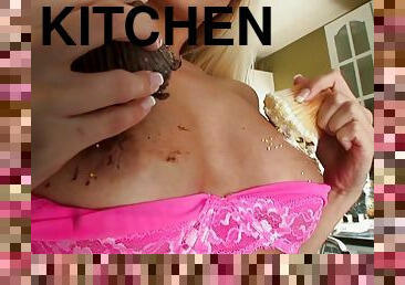 Jana Cova pleases herself with fingering in the kitchen