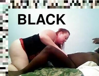 Redhead BBW and her black buddy have ardent oral sex in homemade clip