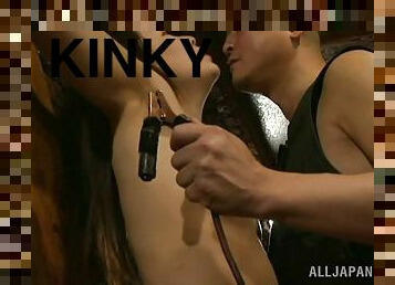 Kinky BDSM action where a girl is tied up and tortured