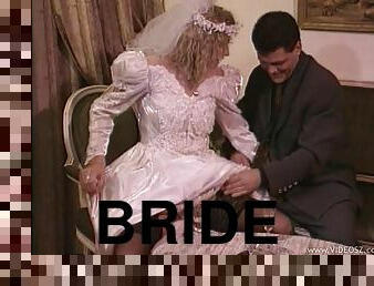 Horny bride sucks on a hard cock before being fucked