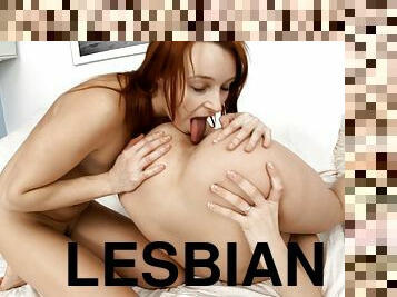 Two bodacious lesbians use their new dildo for sapphic sex