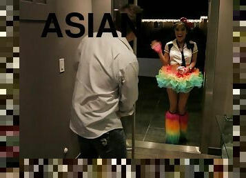 A lovely Asian girl in a nice outfit gets fucked in her shaved pussy