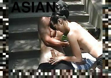 Beautiful Asian Sucks A Big Cock Outdoors In An Amateur Video