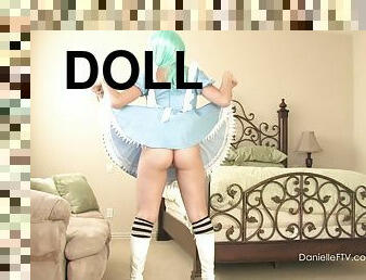 Hot girl in a doll outfit shows pussy and masturbates