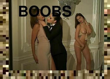 Four stunning chicks lick boobs and pussies in luxurious house