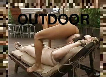 Outdoor femdom session with a charming hun Isis Love