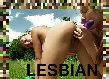 Cute teens have sensual lesbian sex in the country