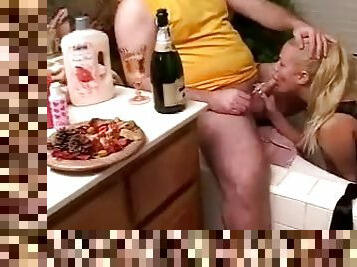 Chubby blonde mom enjoys licking a small cock in a bathroom