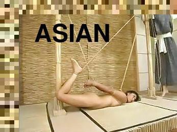 Asian slut is getting tied up and tortured by that woman