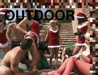 horny chicks in Xmas hats suck and ride dicks outdoors