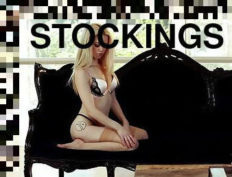 Angelic blond babe Lauren WK spreads her legs in stockings