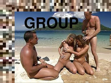 Group sex on the beach with two desirable babes