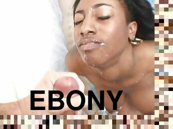 Ebony girl with full lips gives a blowjob to a White dude