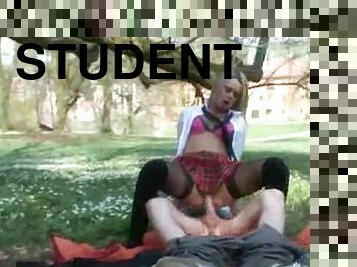 Charming blonde student enjoys upskirt banging in a forest