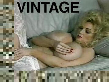 Vintage blonde milf shows off her enormous tits and hairy pussy