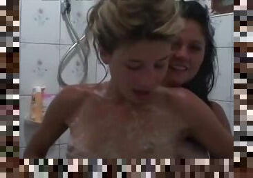 Amateur girls teasing wet bodies in shower