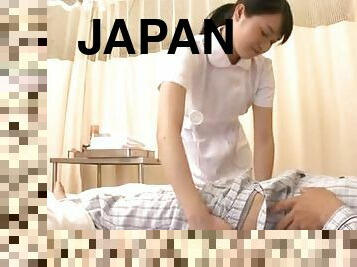 Pretty Japanese nurse gives nice handjob to a patient