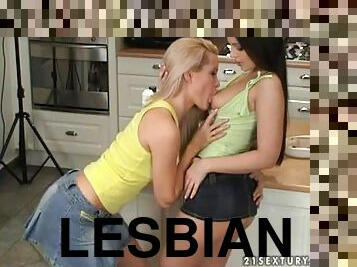 Eve Angel and Sophie Moone have lesbian fun in the kitchen