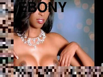 Ebony cutie Kia Drayton shows off her enhanced boobs