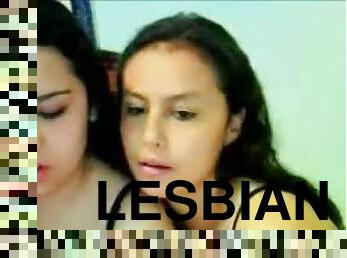 Two horny Latina lesbian fingering each others pussies