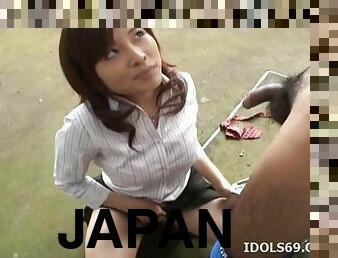 Elegant Japanese broad fingers her pussy while being face fucked outdoors