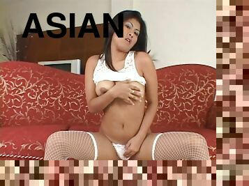 Beautiful Asian in white lingerie and stockings masturbating