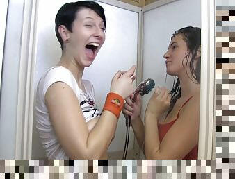 Horny girlfriends shower together then finger and kiss