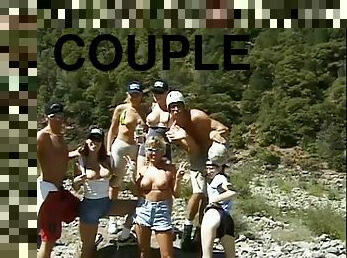 During a river rafting trip this couple fucks at camp