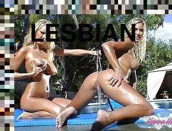 Sexy blondes Nikki Jayne & Hanna Hilton have lesbian fun on a poolside