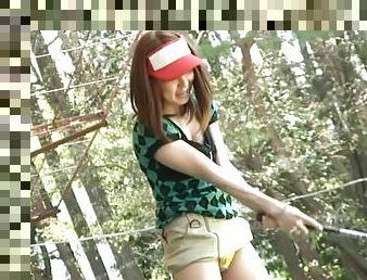 On the golf course this sexy Japanese girl gives a guy head