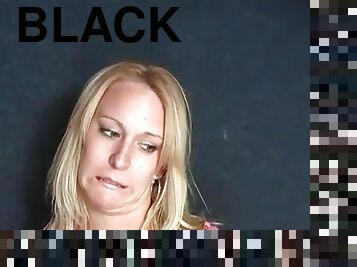 Blonde babe Ruth Blackwell orally pleases a black guy in a gloryhole